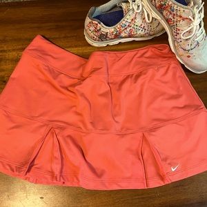 Nike Dri fit athletic skirt, great condition! Lined with shorts! Coral color